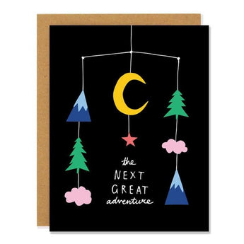 Baby greeting cards featuring a mobile-themed design with a gold moon, blue mountains, green trees, and pink clouds