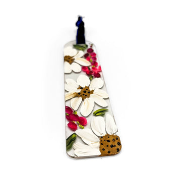 Clear resin bookmark with pressed white flowers and green leaves for books or gifts