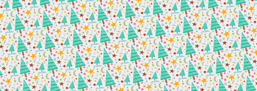 Christmas tree patterned wrapping paper with green and red trees, stars, moons on a white background.