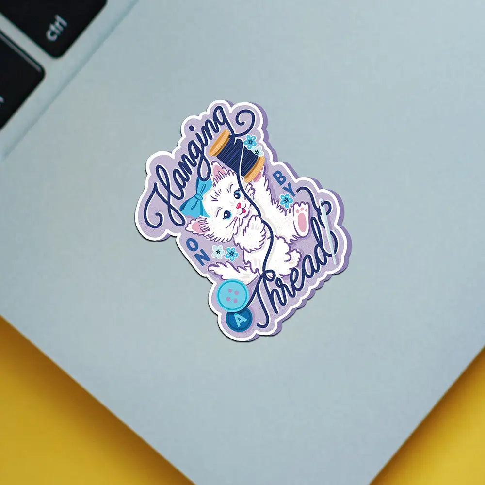 Hanging by a Thread Sticker - to & from Gift Co. - Inkwell – Inkwell ...
