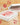 White pizza delivery box with red text and an Oreo cookie on top.
